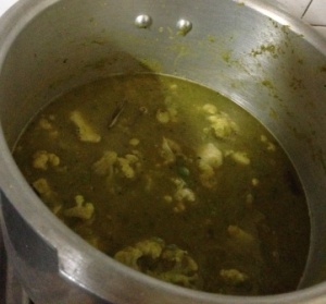 Add peas and cauliflowers and fry. Then add desired amount of water.